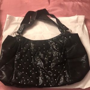 Never used joan Boyce coated fabric tote
